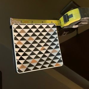 4”x4” ceramic jewelry holder. Black, white & gold triangle design